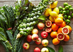 a group of fruits and vegetables on a wood surface Healthy Weight Loss Diets Bracknell